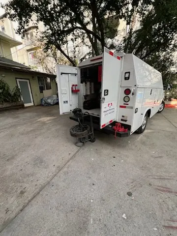 Magnet Plumbing service vehicle on-site for Grease Trap Cleaning in John Char Estates